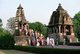 India: A group of Hindu pilgrims visiting the temples of Khajuraho's western complex, Khajuraho, Madhya Pradesh State
